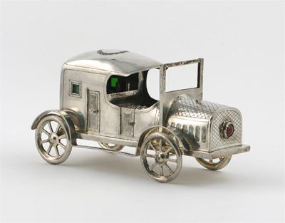 Appraisal: A Chinese silver model of a car with hinged doors