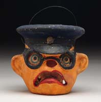 Appraisal: EARLY COMPOSITION CHAUFFEUR JACK-O-LANTERN Pumpkin head lantern with big ears