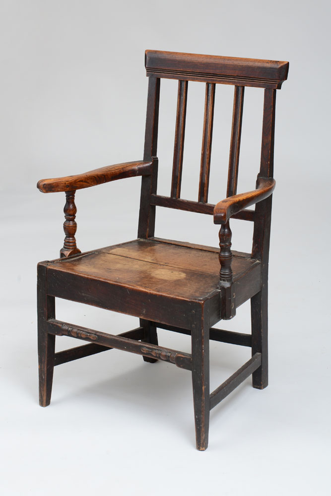 Appraisal: ENGLISH PROVINCIAL STAINED ELM AND PINE ARMCHAIR x x in