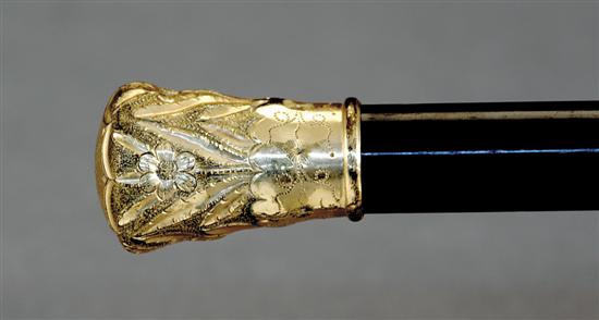 Appraisal: Southern gentleman's walking stick th centuryfloral-chased gold cap on tapering