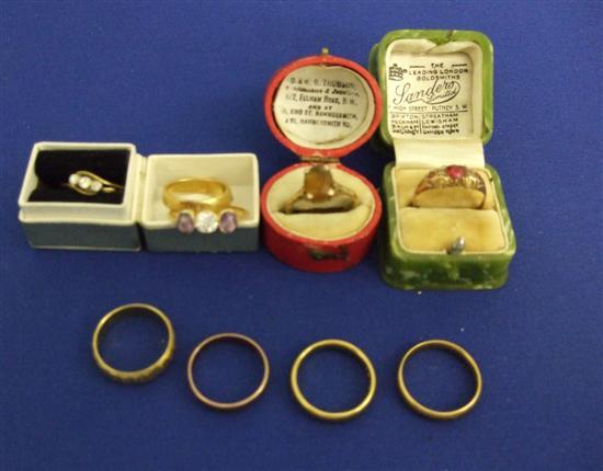 Appraisal: Four gold bands five assorted rings and three stone diamond