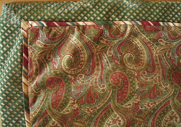 Appraisal: A set of three paisley printed corduroy drapery panels and