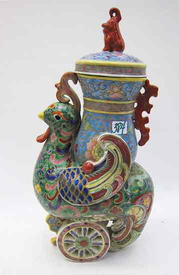 Appraisal: CHINESE HAND ENAMELED PORCELAIN COVERED URN a stylized phoenix bird