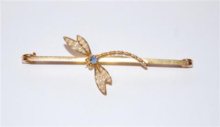 Appraisal: An Edwardian ct gold mounted novelty bar brooch applied to