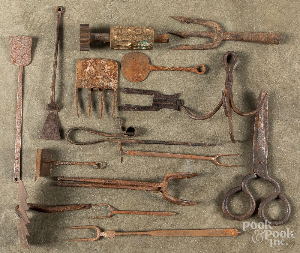 Appraisal: Antique iron utensils and tools Antique iron utensils and tools