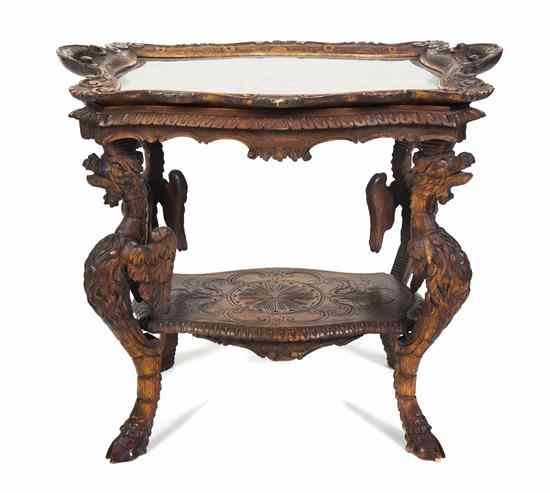 Appraisal: A Carved Tray-Top Table having a shaped handled tray with