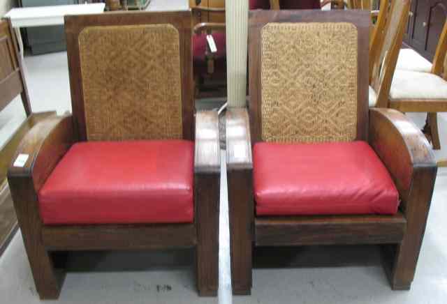 Appraisal: PAIR OF PLANTATION MAHOGANY ARMCHAIRS with matching woven reed back