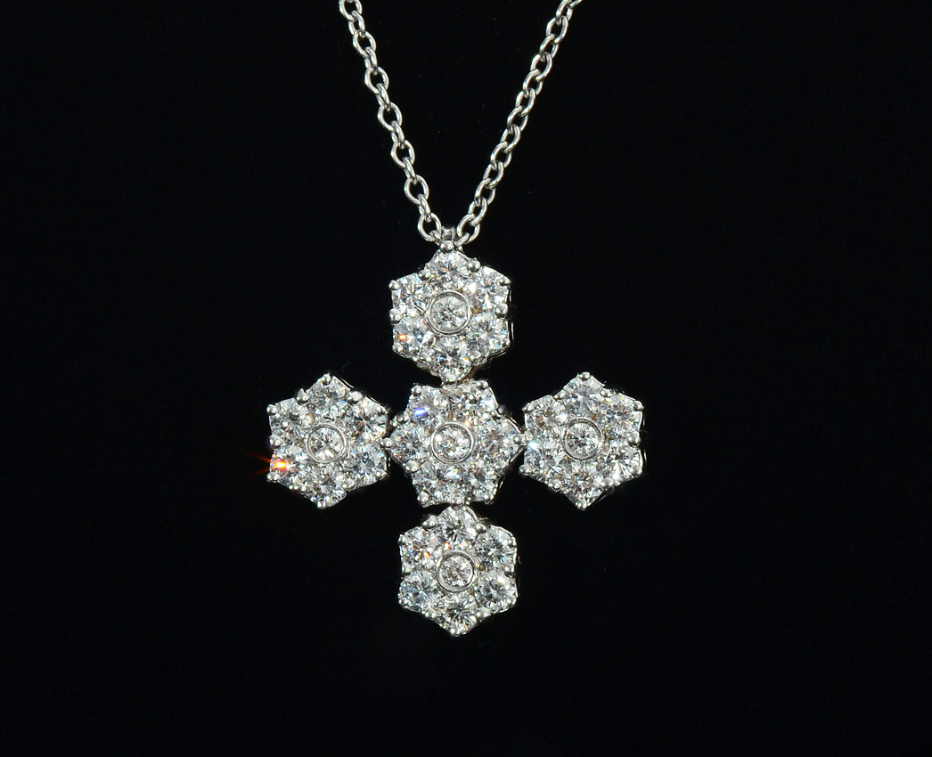 Appraisal: STUNNING K DIAMOND STYLIZED CROSS OR STAR PENDANT NECKLACE K