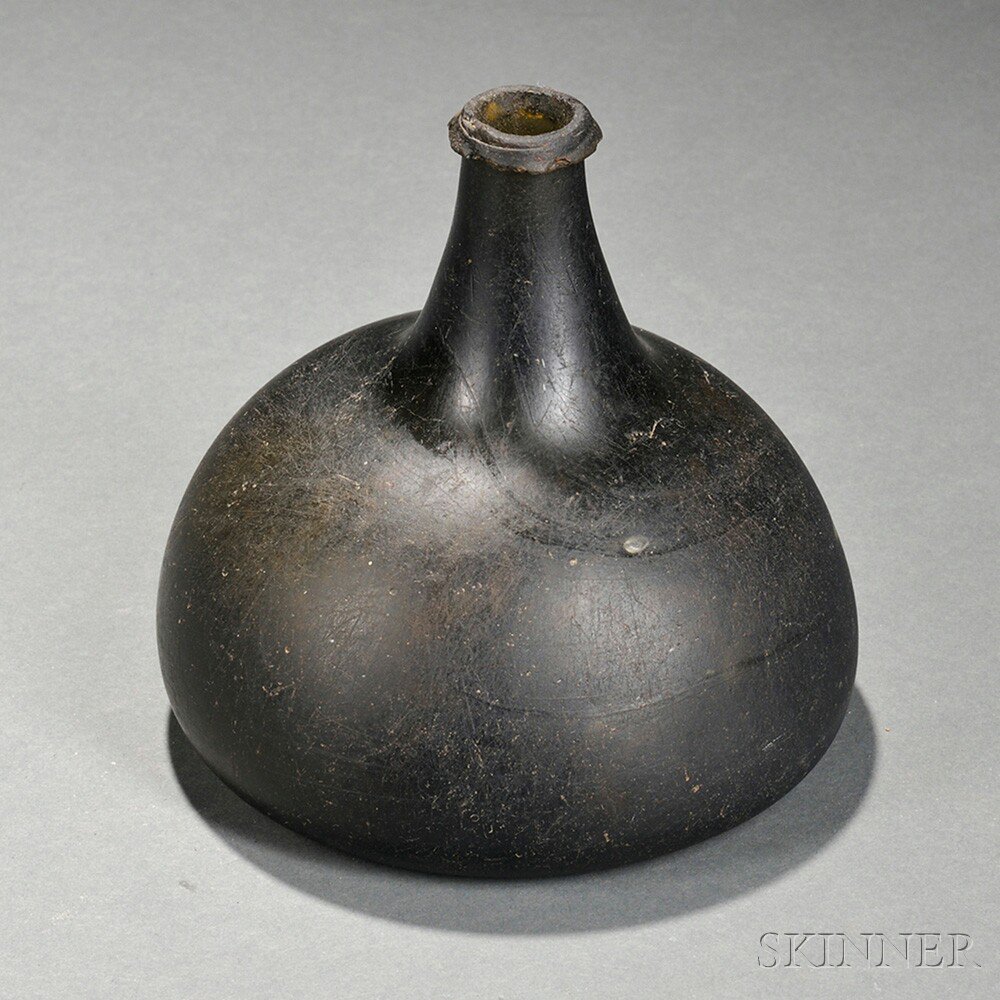 Appraisal: Early Olive Amber Freeblown Rum Bottle England early th century