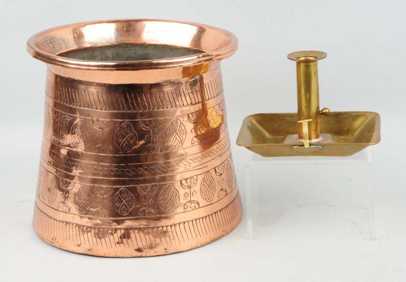 Appraisal: This lot includes a brass candlestick and a copper flower