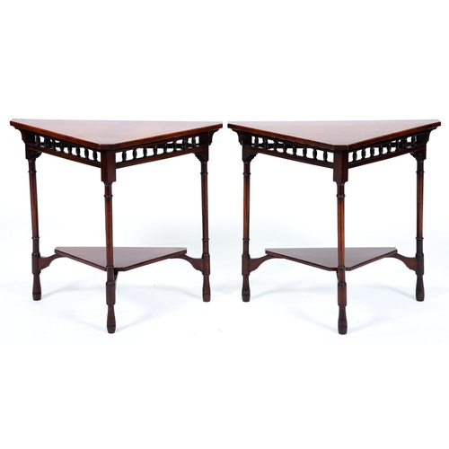 Appraisal: A pair of Edwardian mahogany triangular tables with galleried apron