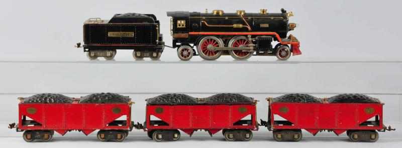 Appraisal: Lionel No E Loco Tender with Hopper Cars Description American