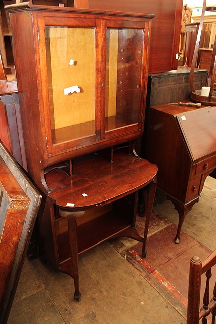 Appraisal: AN EDWARDIAN MAHOGANY BOOKCASE DESK the upper section with glazed