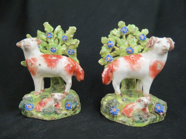 Appraisal: Pair of Staffordshire Pottery Sheep Figurines with lambs