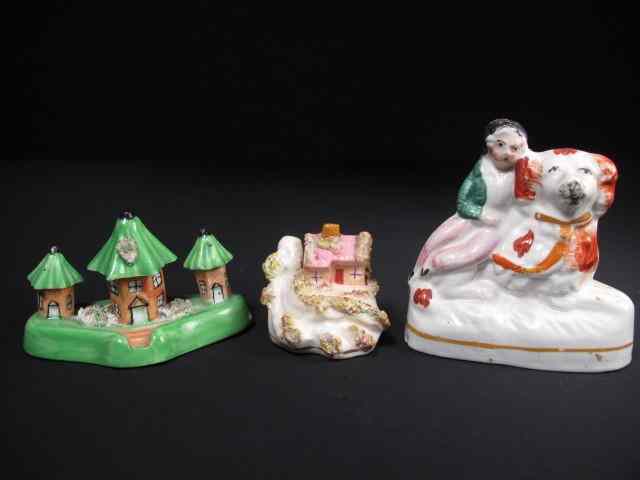 Appraisal: th century porcelain Staffordshire miniatures group Includes small cottage circa