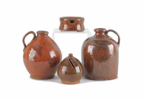 Appraisal: Four pieces of redware th c with manganese decoration tallest