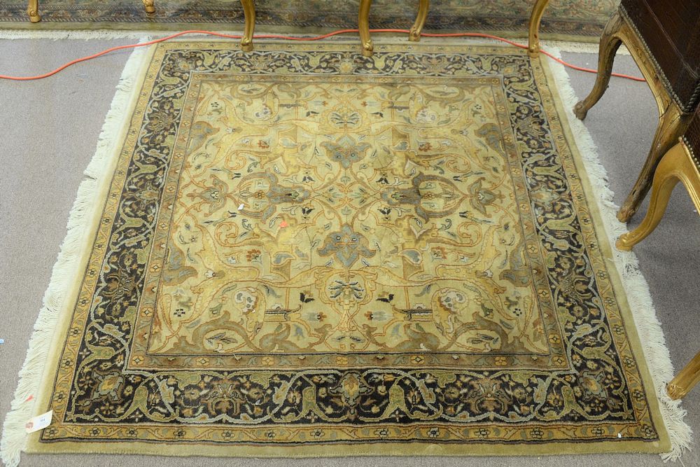 Appraisal: Square Oriental rug tan and green ' x ' Square