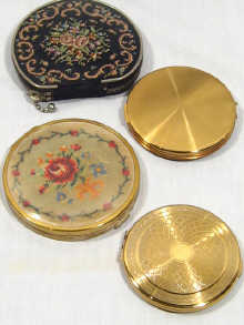 Appraisal: Four ladies compacts comprising three metal compacts and one machine