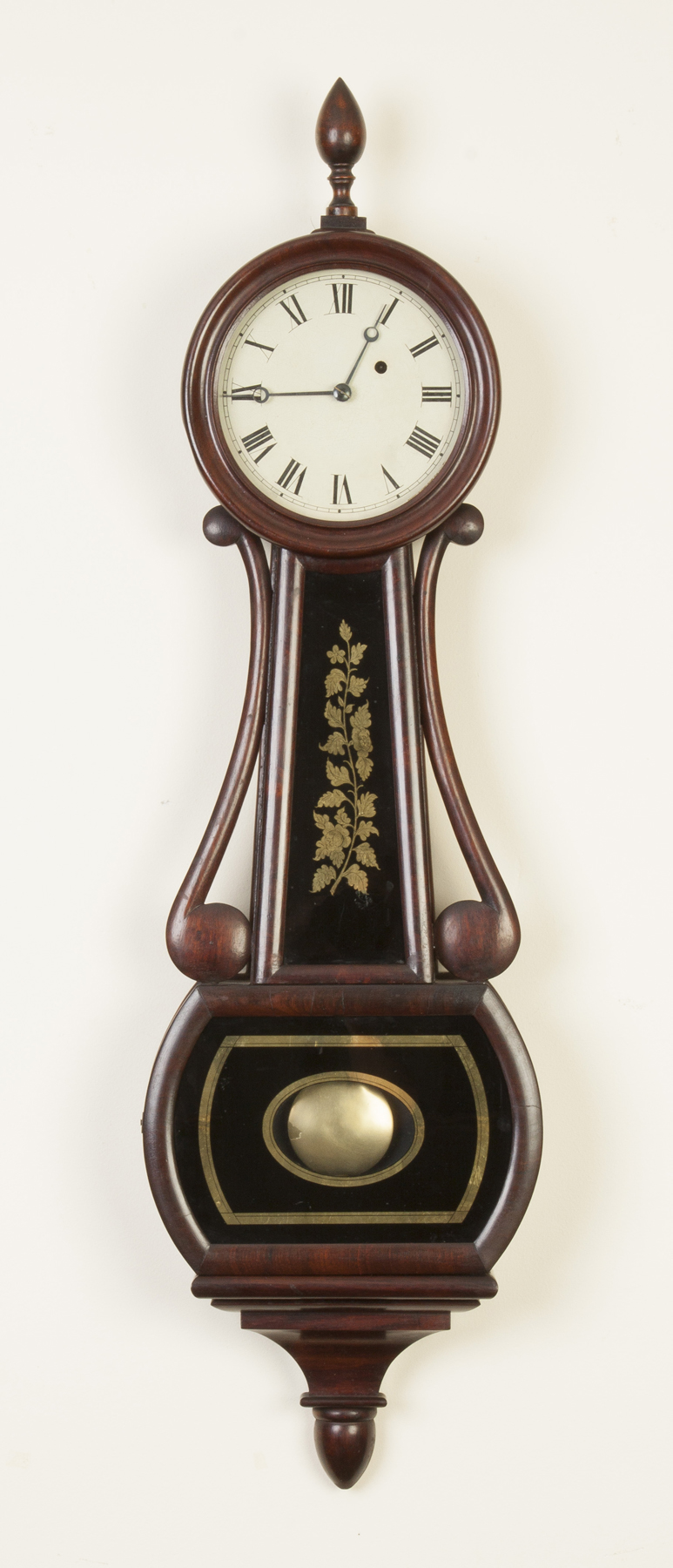 Appraisal: New England Banjo Clock Mahogany case with side arms old