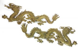 Appraisal: Pair of Chinese style brass figural wall hangings each depicting