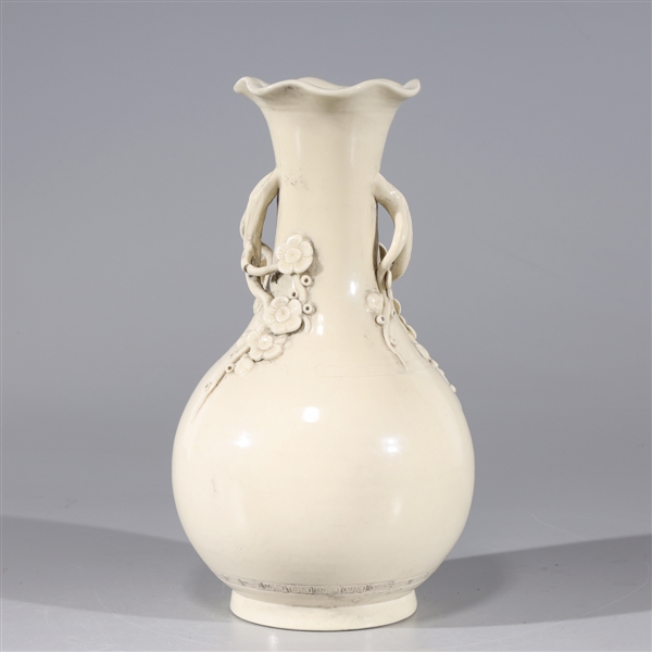 Appraisal: Chinese blanc de chine porcelain vase with molded handles and