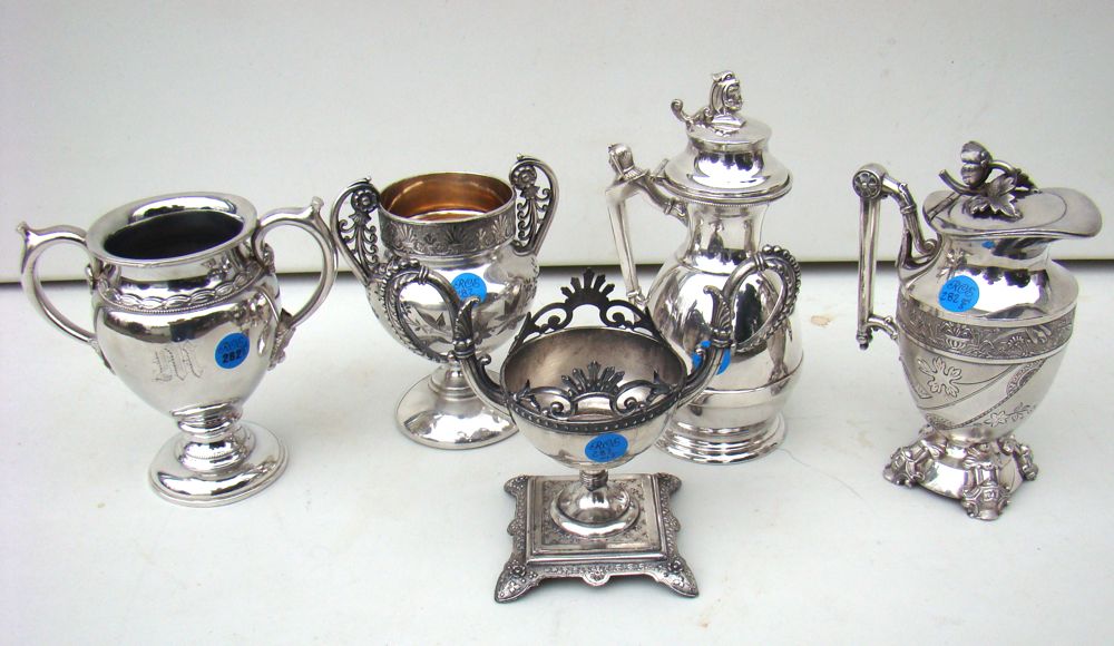 Appraisal: FIVE PIECES OF SILVER PLATED HOLLOWWARE th CenturyBy various makers