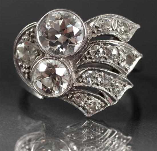 Appraisal: Art Deco platinum and diamond stylized comet ring first center