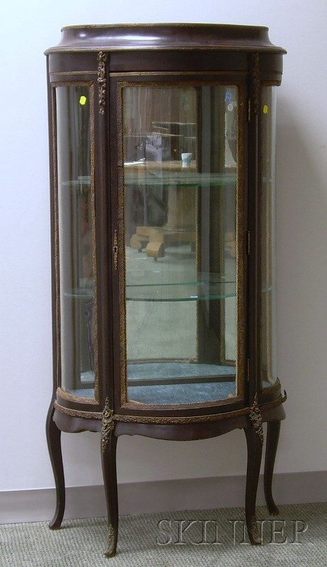 Appraisal: Louis XV Style Gilt-brass Mounted Stained Hardwood Serpentine Vitrine interior