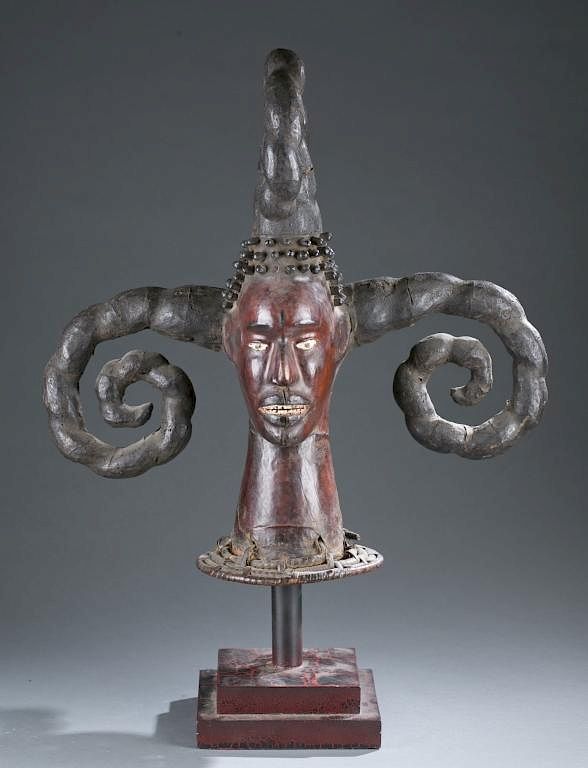 Appraisal: Skin covered headdress with curled horns A skin covered headdress