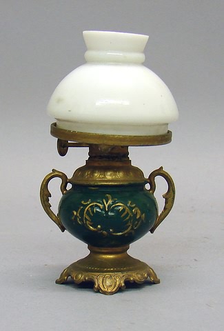 Appraisal: Larger scale hurricane lamp with milk glass shade metal base