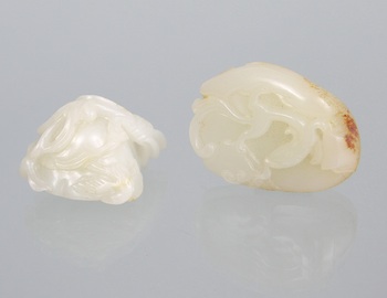 Appraisal: A Pair of White Jade Carvings Chinese Containing a white