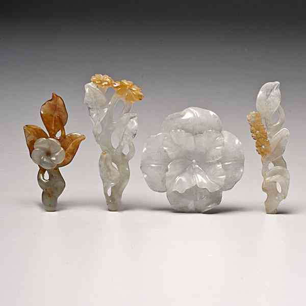 Appraisal: Chinese Jadeite Floral Carvings Chinese th century a group of