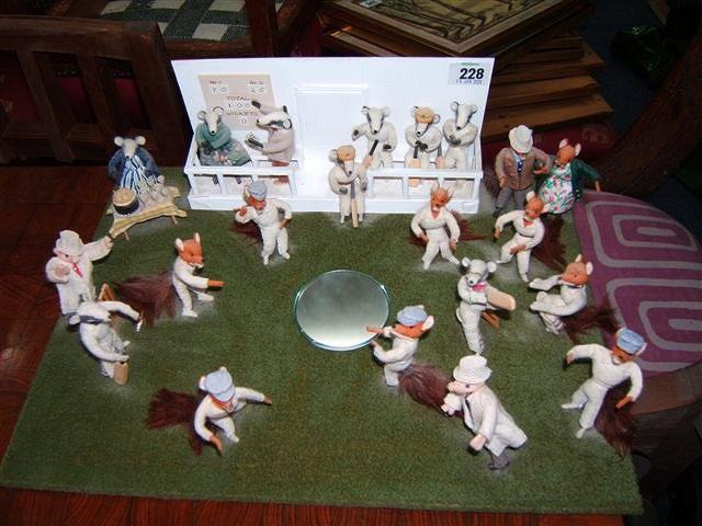 Appraisal: A small felt diorama depicting various woodland animals playing cricket