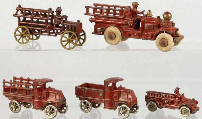 Appraisal: Lot of Cast Iron Vehicle Toys Description American Various makers