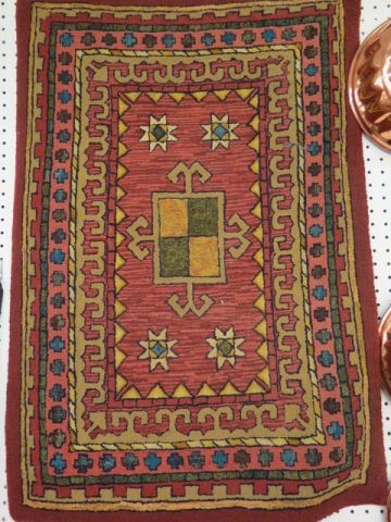 Appraisal: Antique Hooked Rug geometric designs red field ' x '