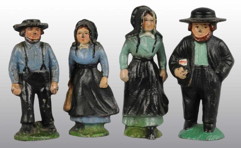 Appraisal: Cast Iron Amish Men Women Desk Novelties Description Made by