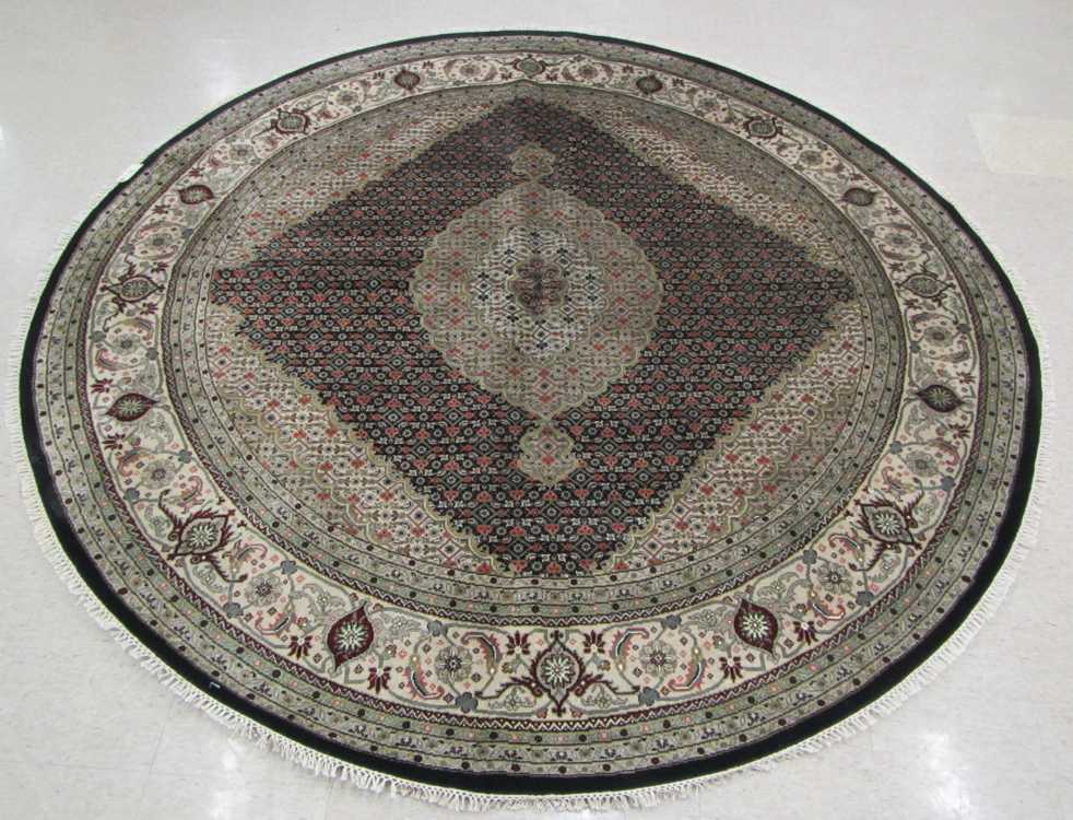 Appraisal: A ROUND ORIENTAL CARPET Indo-Bijar overall Herati floral design in