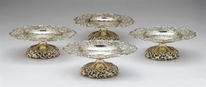 Appraisal: Set of four sterling silver pierced tazzae retailed by j