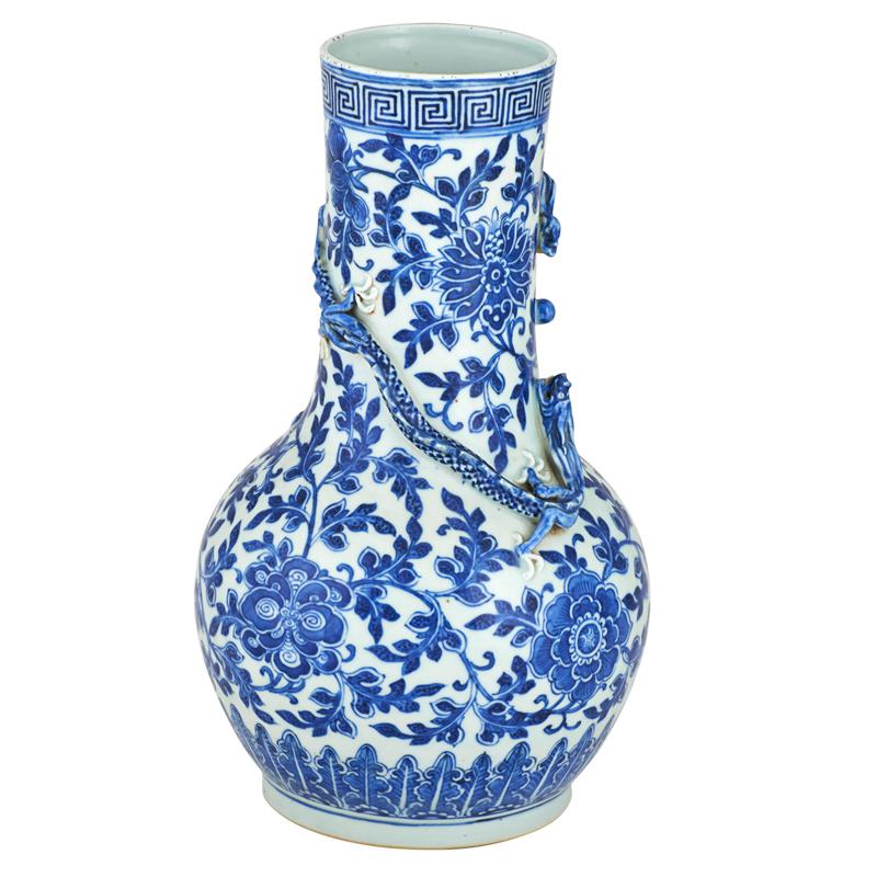 Appraisal: JAPANESE BLUE AND WHITE PORCELAIN VASE Floral decoration with applied