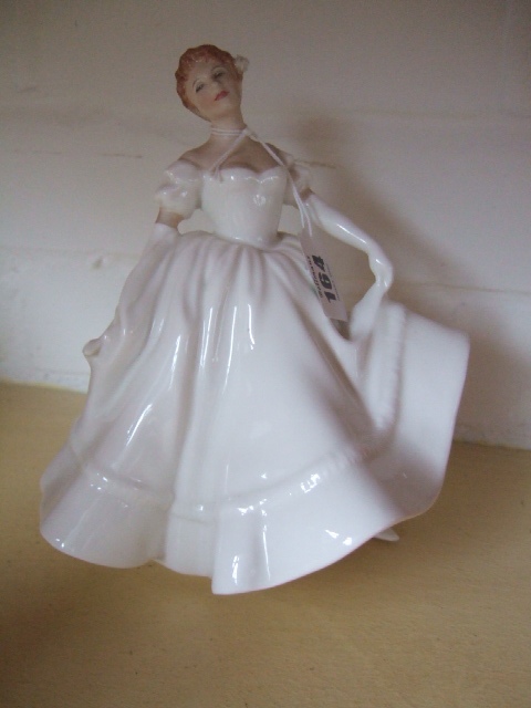 Appraisal: A Royal Doulton figure Nancy HN