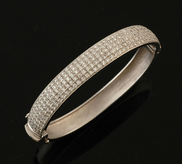 Appraisal: A diamond bangle The ct white gold hinged bangle pave