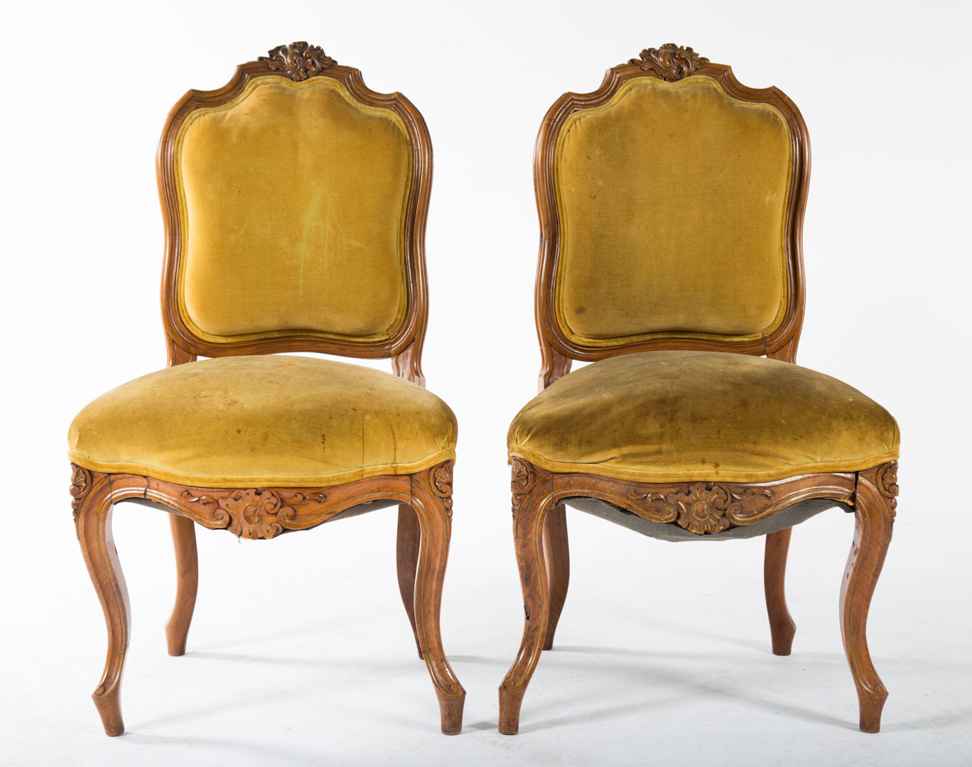 Appraisal: Louis XV style walnut fauteuils th century foliate carved crest