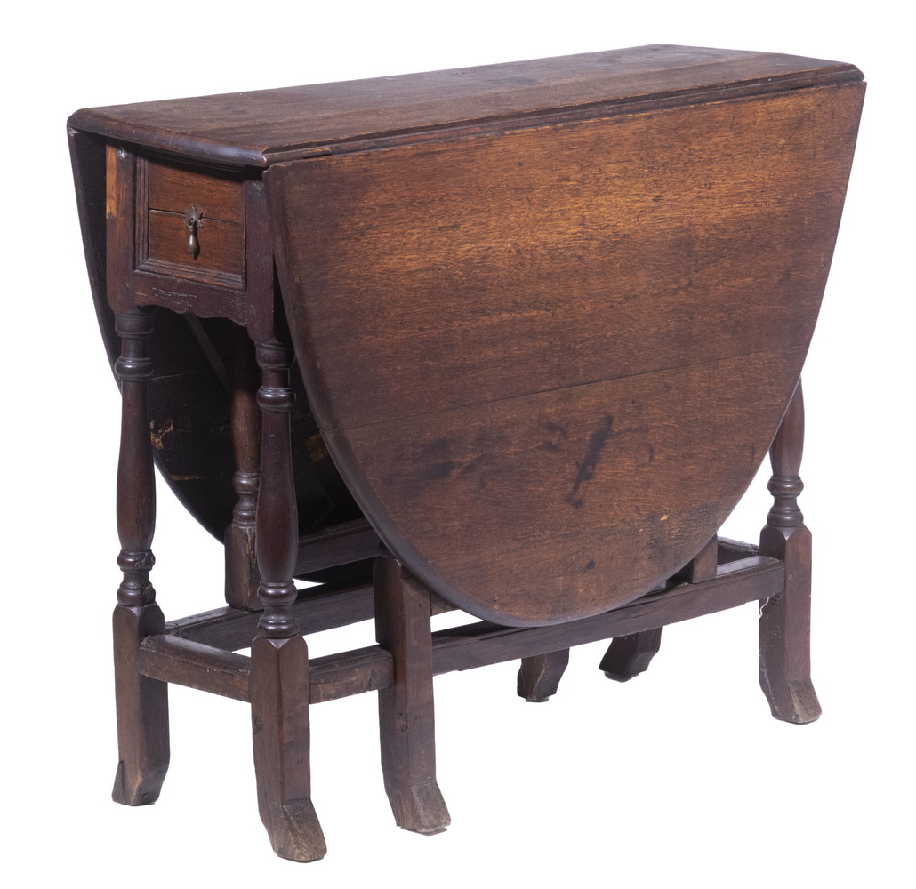 Appraisal: TH C ENGLISH OAK GATELEG TABLE Elongated Oval Top 'butterfly'