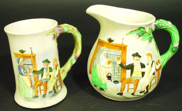 Appraisal: Crown Devon musical tankard and a matching jug both relief