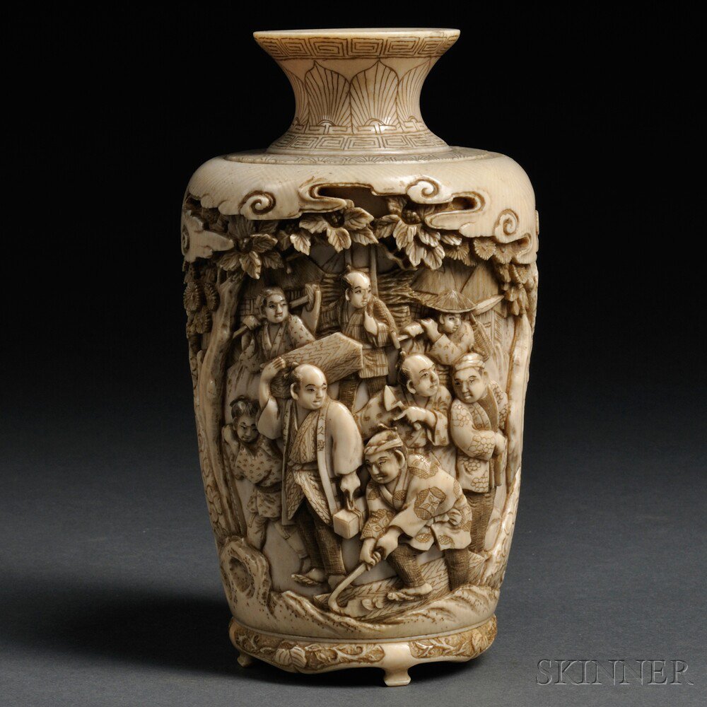 Appraisal: Ivory Vase Japan th century carved with two panels divided