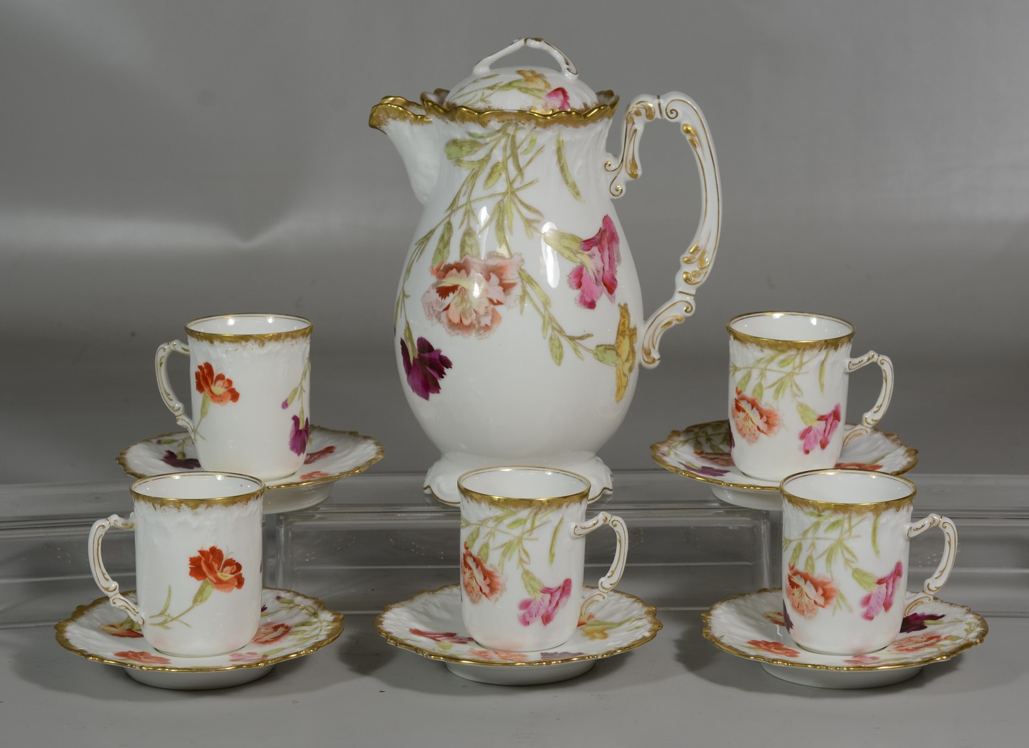 Appraisal: Limoges chocolate set to include a chocolate pot cups and