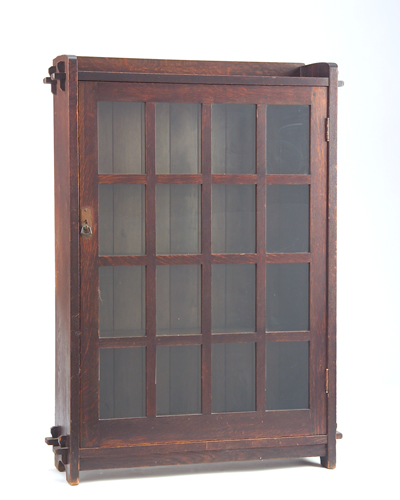 Appraisal: L J G STICKLEY Single-door bookcase no with gallery top