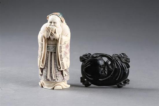 Appraisal: IVORY CARVING OF ROBED MAN China Bearded man drinking tea