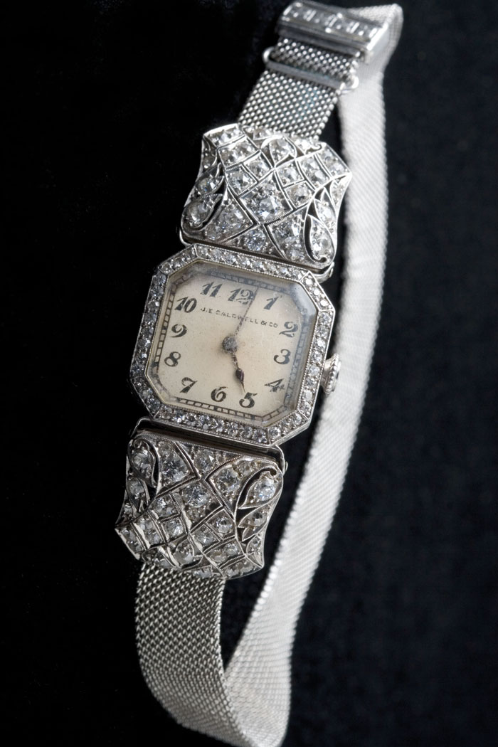 Appraisal: LADY'S DIAMOND AND PLATINUM WRISTWATCH Wristwatch has a rectangular dial