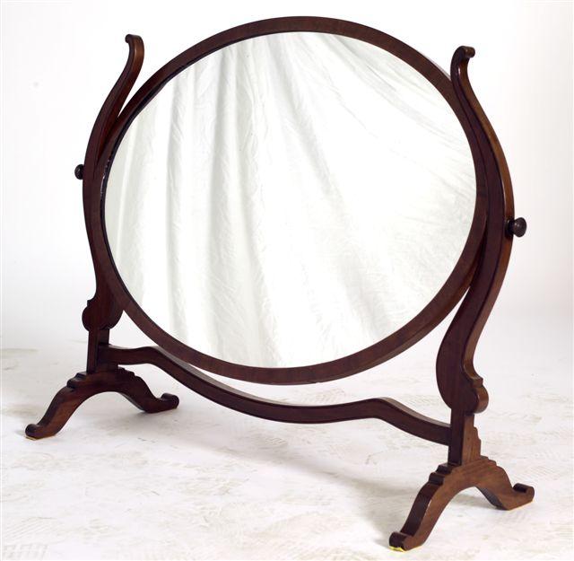 Appraisal: LARGE GEORGE III STYLE MAHOGANY TOILET MIRROR of oval form